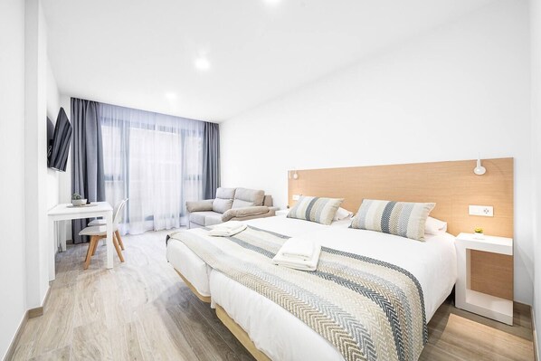 Iron/ironing board, travel crib, WiFi, bed sheets