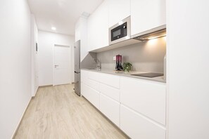 Fridge, microwave, toaster, cookware/dishes/utensils