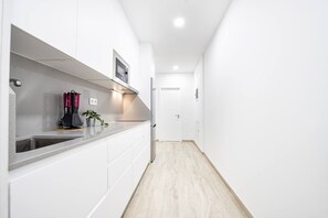 Fridge, microwave, toaster, cookware/dishes/utensils