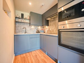 Fridge, microwave, oven, cookware/dishes/utensils