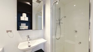 Shower, eco-friendly toiletries, hair dryer, towels