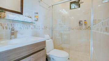 Shower, hair dryer, towels, soap