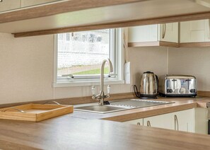 Fridge, oven, stovetop, toaster - 3 bedroom accommodation in Nr St Austell (Nr St Austell)