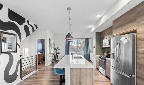 Microwave, oven, stovetop, dishwasher - Artsy 3-Bedroom/3.5 Bath Townhouse in Lakewood, CO - Downtown Denver & Red Rocks (Lakewood)