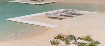 GuestHost - Charming 40 sqm apartment with seaview, able to accommodate 4 people, located inside the renowned Borgo 84 residence, equipped with swimming pool and cycle path. The property is located just 3 km from the center of Marzamemi, one of the most