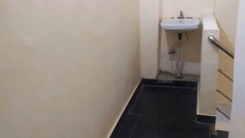 Standard Double Room, City View | Bathroom | Shower, free toiletries, slippers, towels