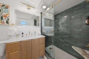 Shower, hair dryer, towels, soap