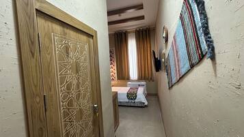 Standard Single Room | Bathroom | Shower, hair dryer, slippers, towels