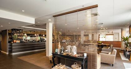Relax and Unwind on the Garden Terrace, with Golf Nearby and Free Parking