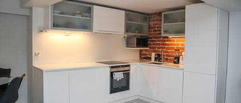 Appartement Penthouse Deluxe, balcon, vue sur la cour intérieure | 1 chambre, fer et planche à repasser, accÚs au Wi-Fi (inclus)