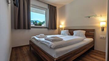 Desk, laptop workspace, blackout curtains, soundproofing