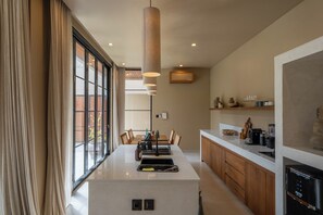 Fridge, stovetop, coffee/tea maker, highchair