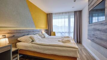 Standard Double Room, City View | In-room safe, desk, laptop workspace, blackout drapes