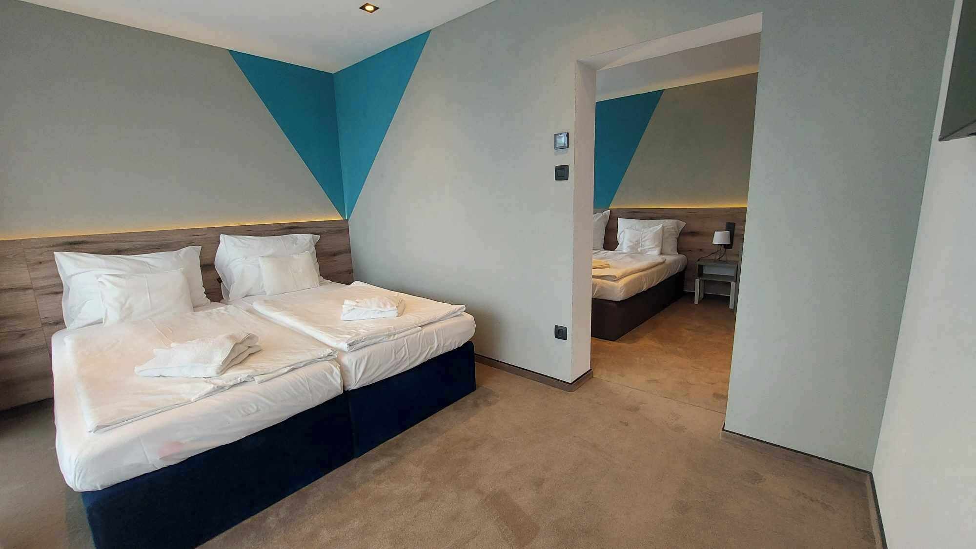 Family Room | In-room safe, desk, laptop workspace, blackout drapes