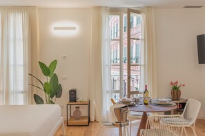 Family Room, City View | Premium bedding, memory-foam beds, minibar, desk