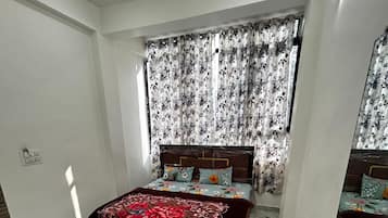 Deluxe Double Room, City View | In-room safe, soundproofing, free WiFi, bed sheets
