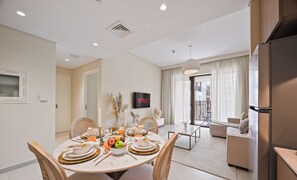 Classic Apartment, Balcony, Pool View | Living area - Tranquil Boho 1BR in Surf 2 Creek Beach (Dubai)