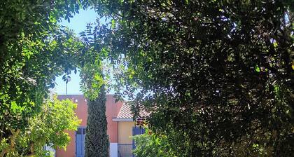 Comfortable 2-bedroom holiday home in Anarita Valley complex with large pools.