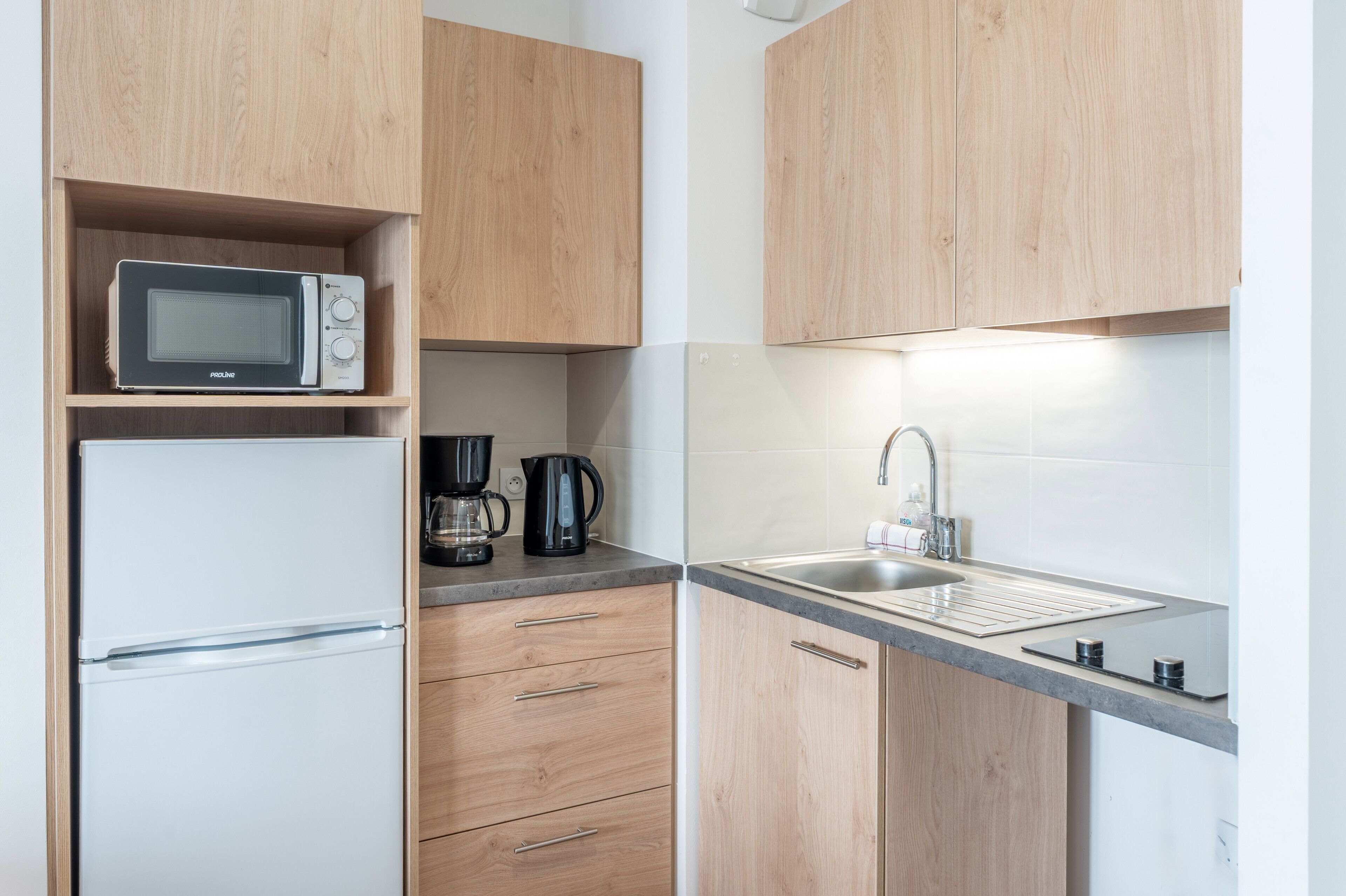 Mini-fridge, microwave, stovetop, cookware/dishes/utensils