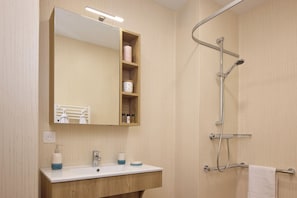 Shower, towels, soap, shampoo