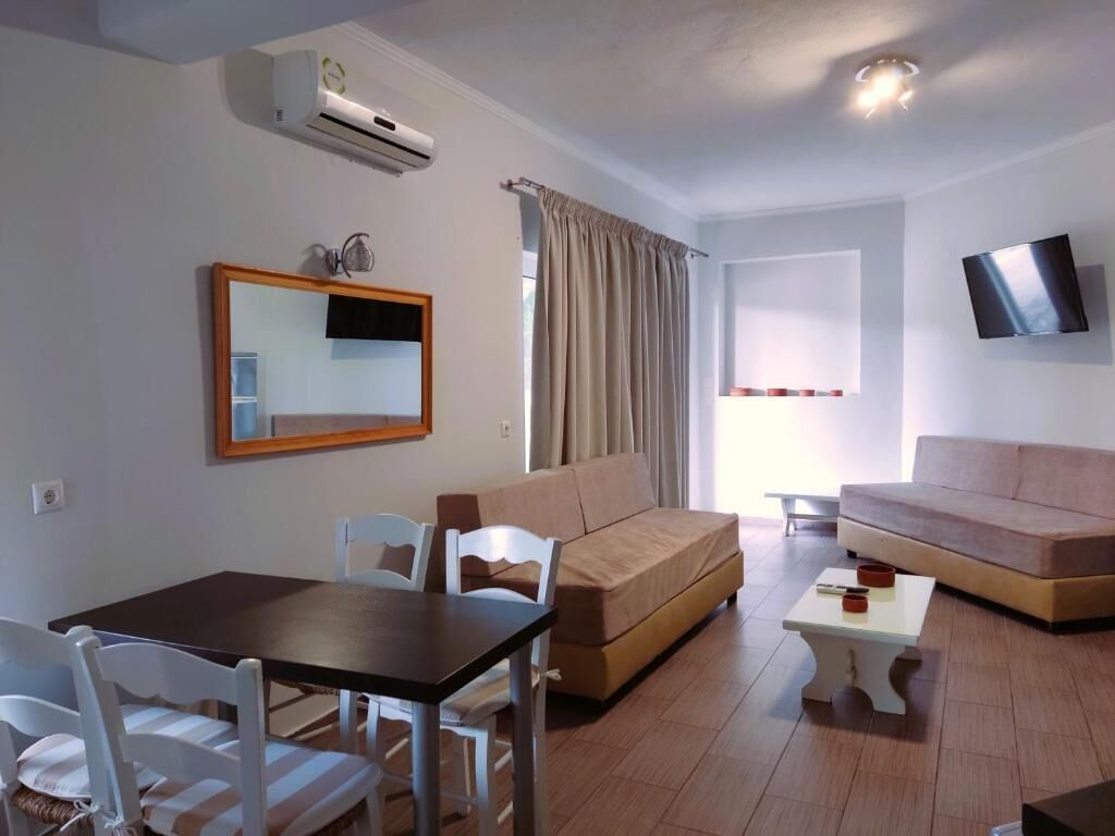 Deluxe appartement, op benedenverdieping | Woonruimte | Televisie