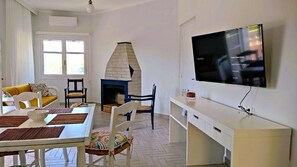 Superior Apartment | Living area | TV