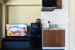 Basic Quadruple Room, 2 Double Beds, Non Smoking, Private Bathroom | Living area - CU Host Dotonbori No.1 Mansion (Osaka)