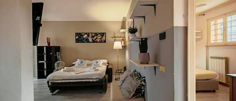 1 slaapkamer, een strijkplank/strijkijzer, gratis wifi, beddengoed