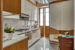 Comfort Apartment, City View | Private kitchen | Coffee/tea maker, electric kettle - JOIVY Captivating flat with balcony (Milan)