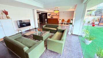 Habitación Deluxe | Área de sala de estar