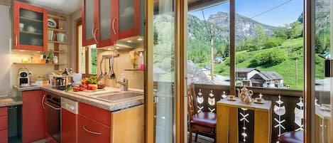 Family Apartment, Multiple Bedrooms, 2 Bathrooms, Mountainside (Casa Andy 2 Val Lavizzara) | Private kitchen | Fridge, microwave, oven, stovetop