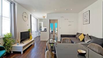 Apartment, 2 Bedrooms | Living area | Flat-screen TV