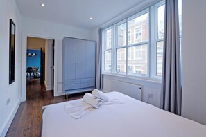 Appartement, 2 slaapkamers | Een strijkplank/strijkijzer, gratis wifi