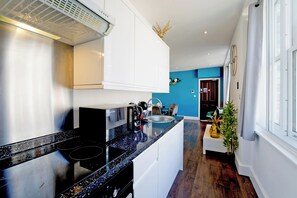 Appartement, 2 slaapkamers | Privékitchenette | Een waterkoker, een broodrooster