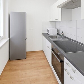 Fridge, microwave, cookware/dishes/utensils