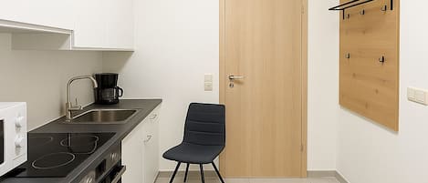 Fridge, microwave, cookware/dishes/utensils