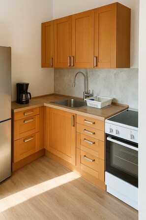 Fridge, microwave, cookware/dishes/utensils