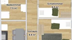 Un plan d’étage comprenant un salon (8,8 m²), une chambre (17,5 m²), une salle de bain (7,5 m²), une salle de toilettes (12,6 m²) et un balcon (9,3 m²).