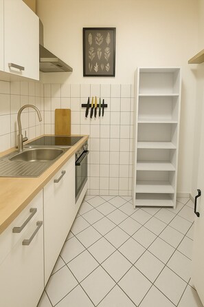 Fridge, microwave, cookware/dishes/utensils