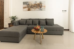 Deluxe Villa, 2 Bedrooms, Pool View | Living area | 55-inch flat-screen TV with cable channels