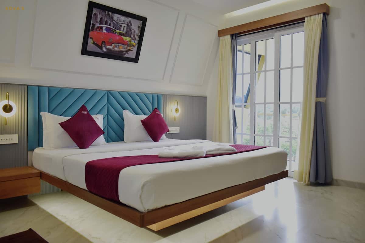 Grand Double Room | Living area | 40-inch LED TV with digital channels