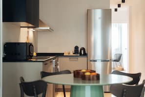 Apartment, City View | Private kitchen | Fridge, microwave, oven, stovetop