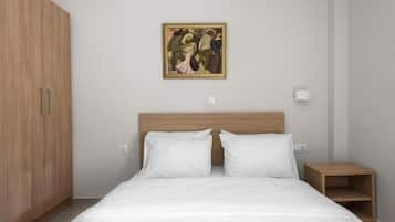 Un dormitorio con cama, armario de madera, mesita de noche y un cuadro en la pared.
