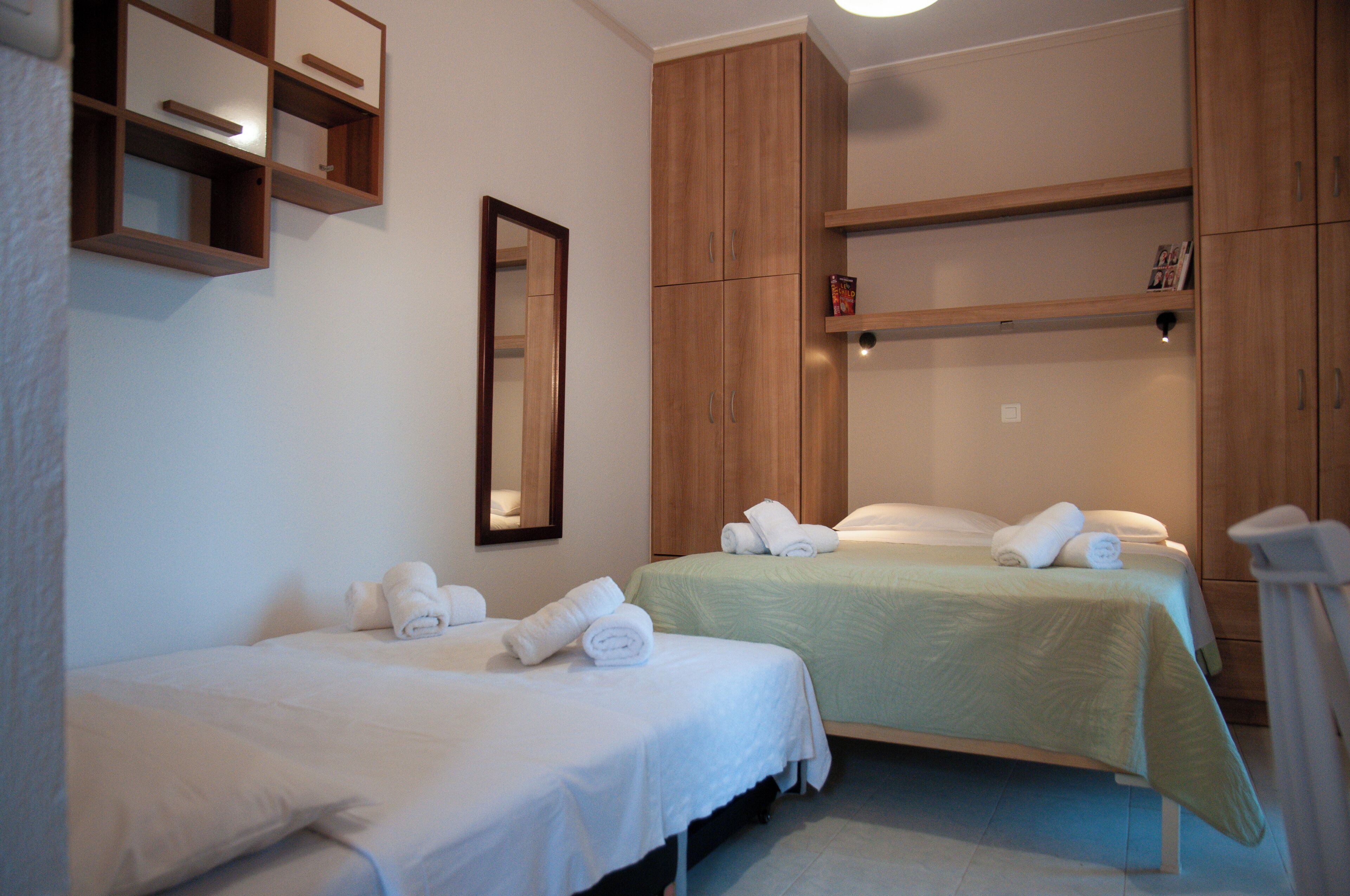 Luxury Triple Room 101, Partial Sea View | Individually decorated, individually furnished, laptop workspace