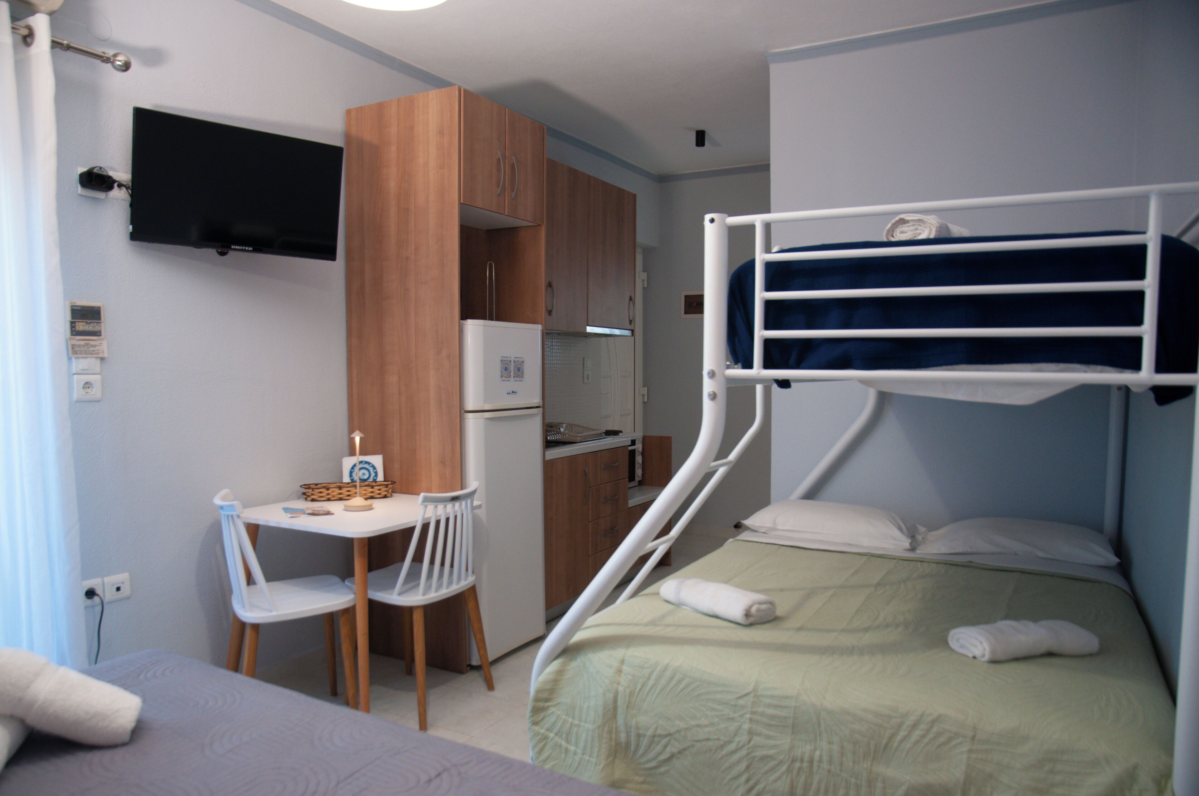 Deluxe Studio 205, Sea View | Living area | Smart TV