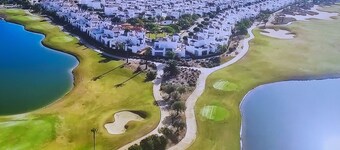 Beautiful 2 bedroom West facing house over looking a lake and golf course