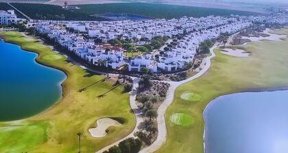 Beautiful 2 bedroom West facing house over looking a lake and golf course