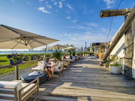 Terrace/patio. Secluded Glamping | Open Dining | Harbor Sunsets