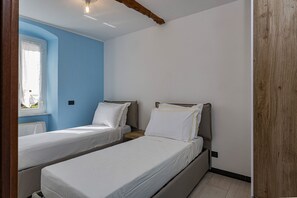 2 slaapkamers, een strijkplank/strijkijzer, gratis wifi, beddengoed