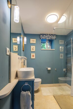 Hair dryer, towels, soap, toilet paper